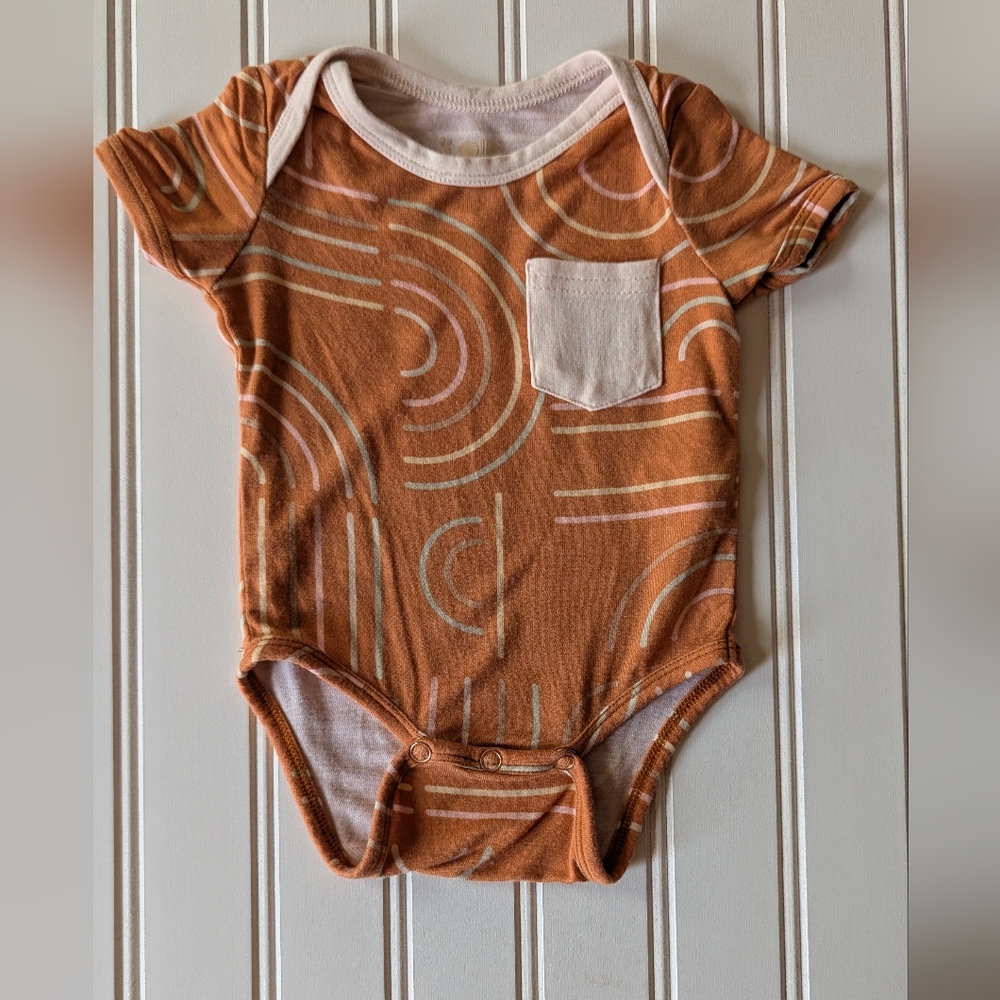 Dot Dot Smile Orange and White Bodysuit with Artistic Swirls